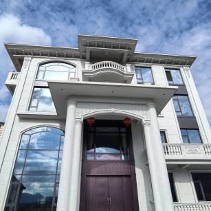 阜新白麻别墅外墙干挂石材效果示例