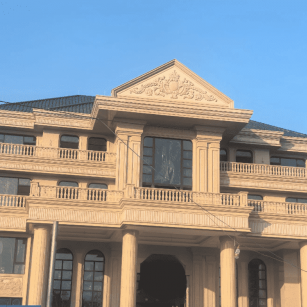 阜新黄金麻别墅外墙干挂石材效果示例