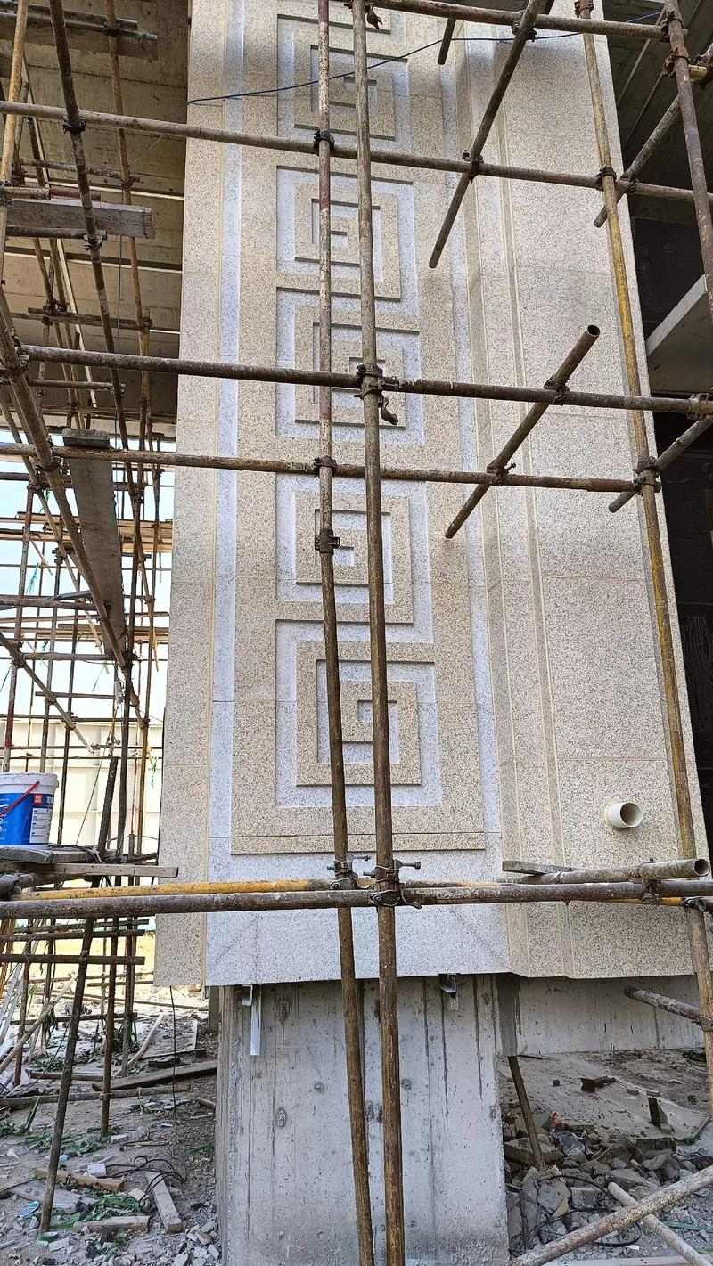 阜新 黄金麻花岗岩别墅外墙干挂回纹造型效果